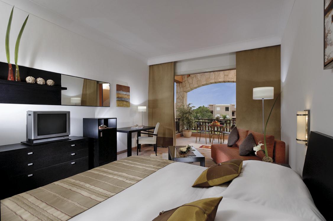 艾尔索克纳瑞享酒店 艾因苏赫纳 客房 照片 A room at the hotel